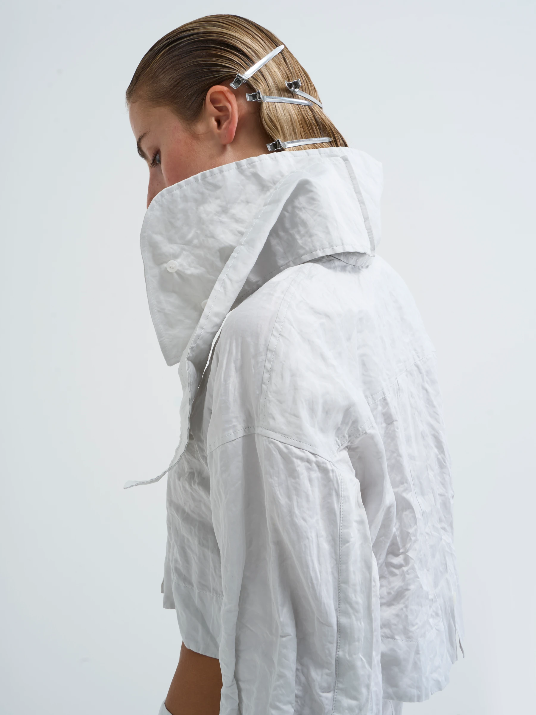 White cropped shirt in Palimpsest, side view