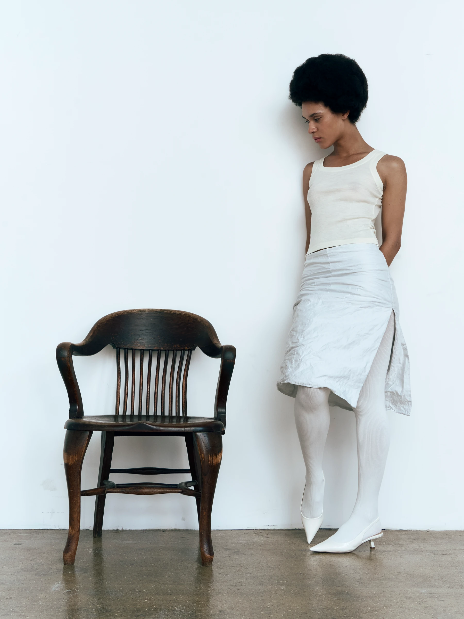 White midi skirt in Palimpsest, side view