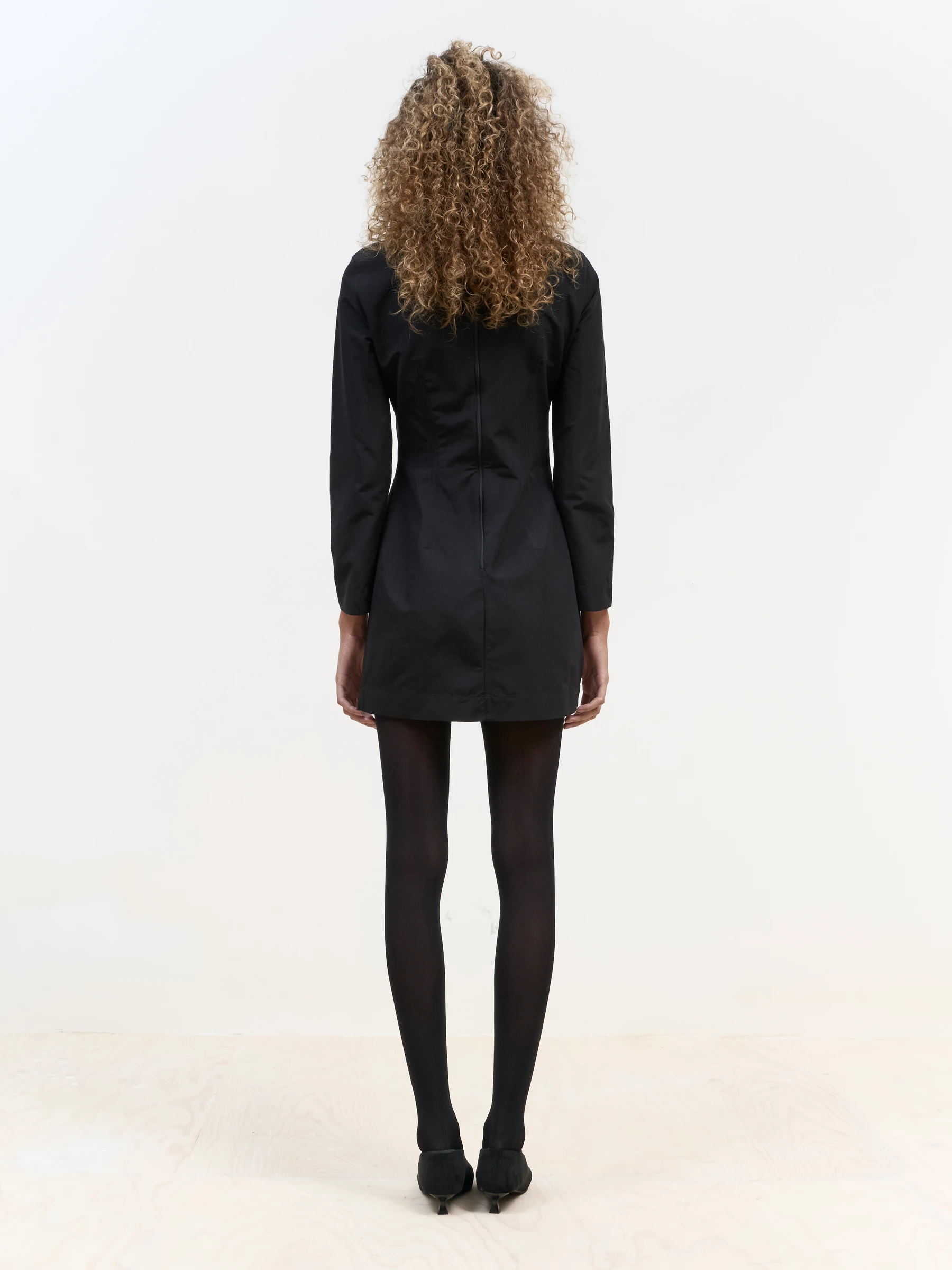 Long sleeve black mini dress in Carbon, back view