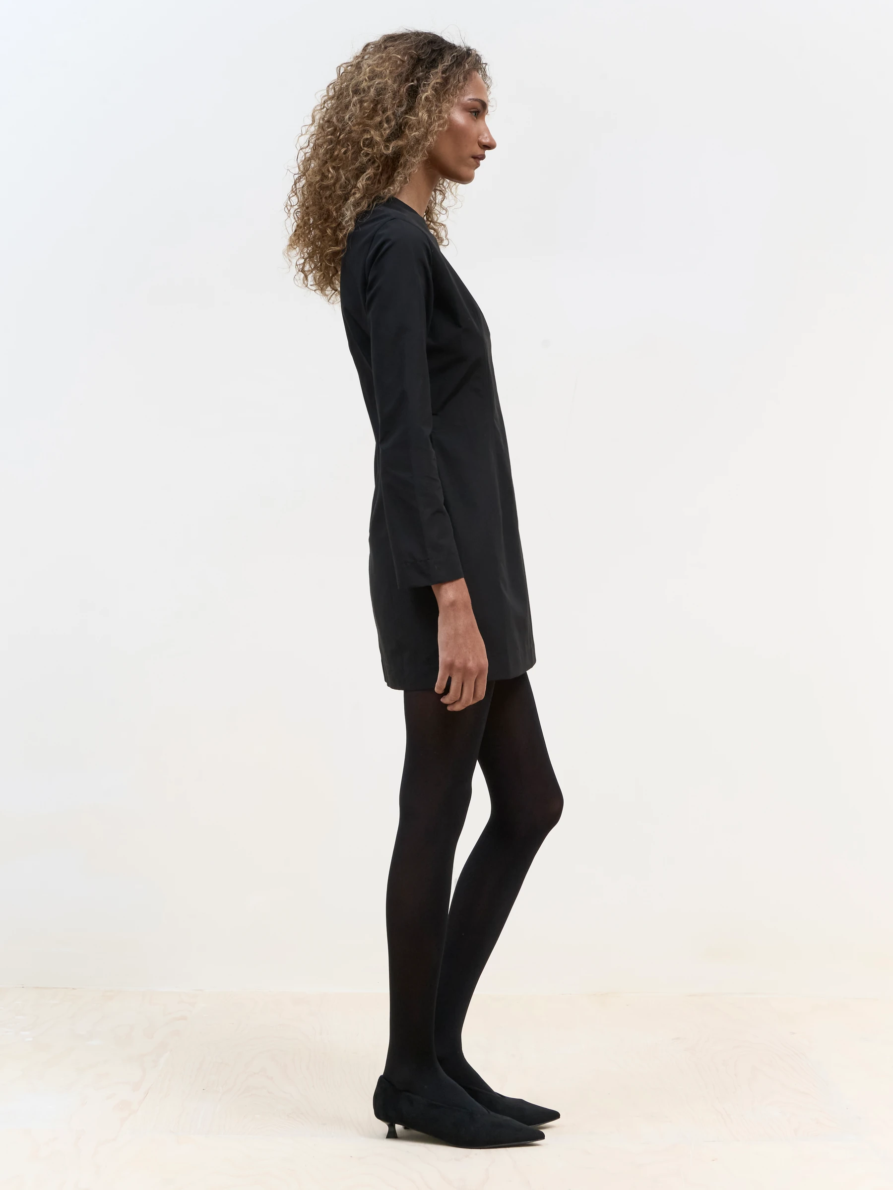 Long sleeve black mini dress in Carbon, side view