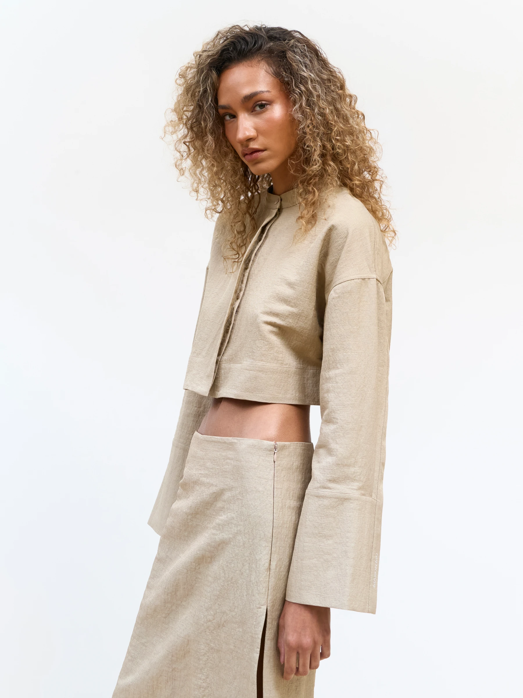 Beige cropped jacket in Foxing, three-quarter view