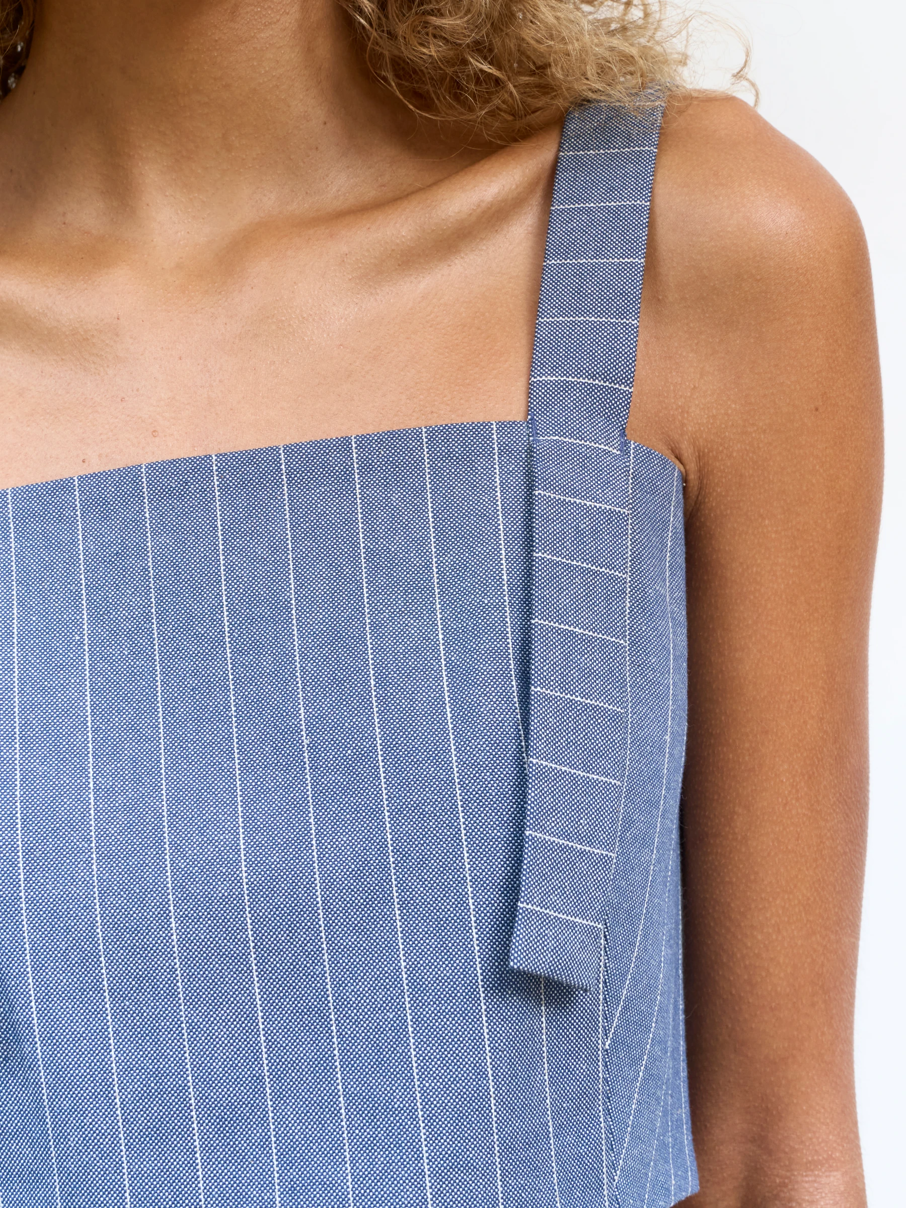 Blue square neck tank top in Faded Ink, detail showing blue pinstripe crop top with shoulder strap