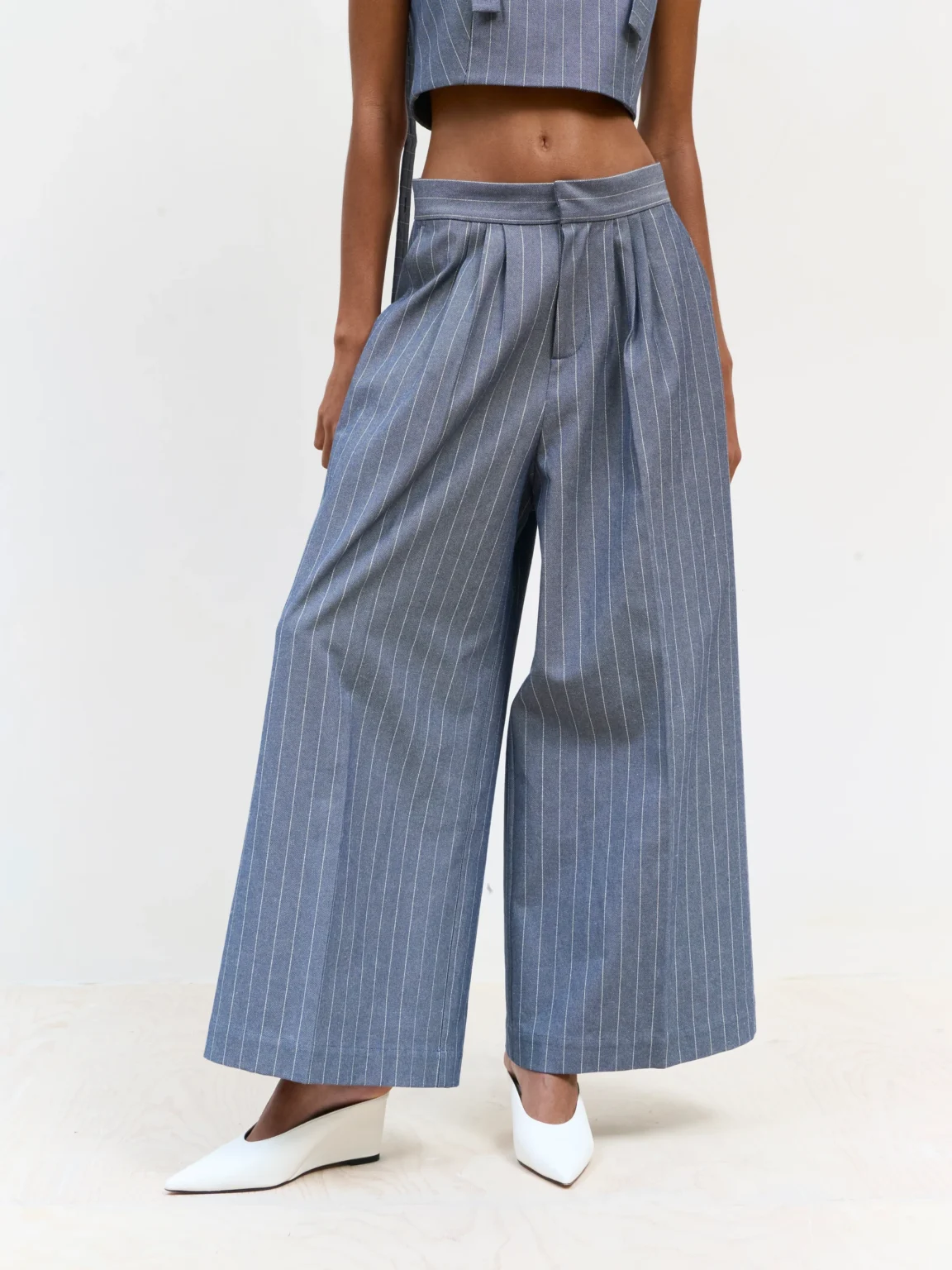 Blue pinstripe pants in Faded Ink, front view