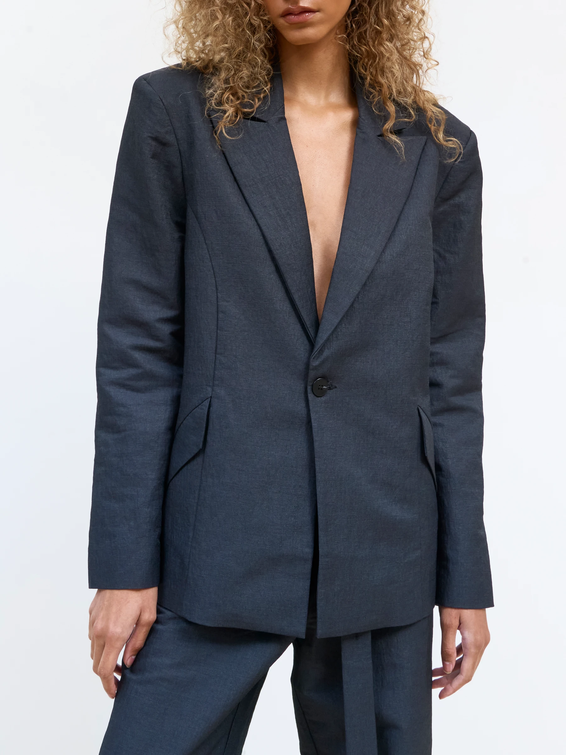 Black backless blazer in 9B, front view