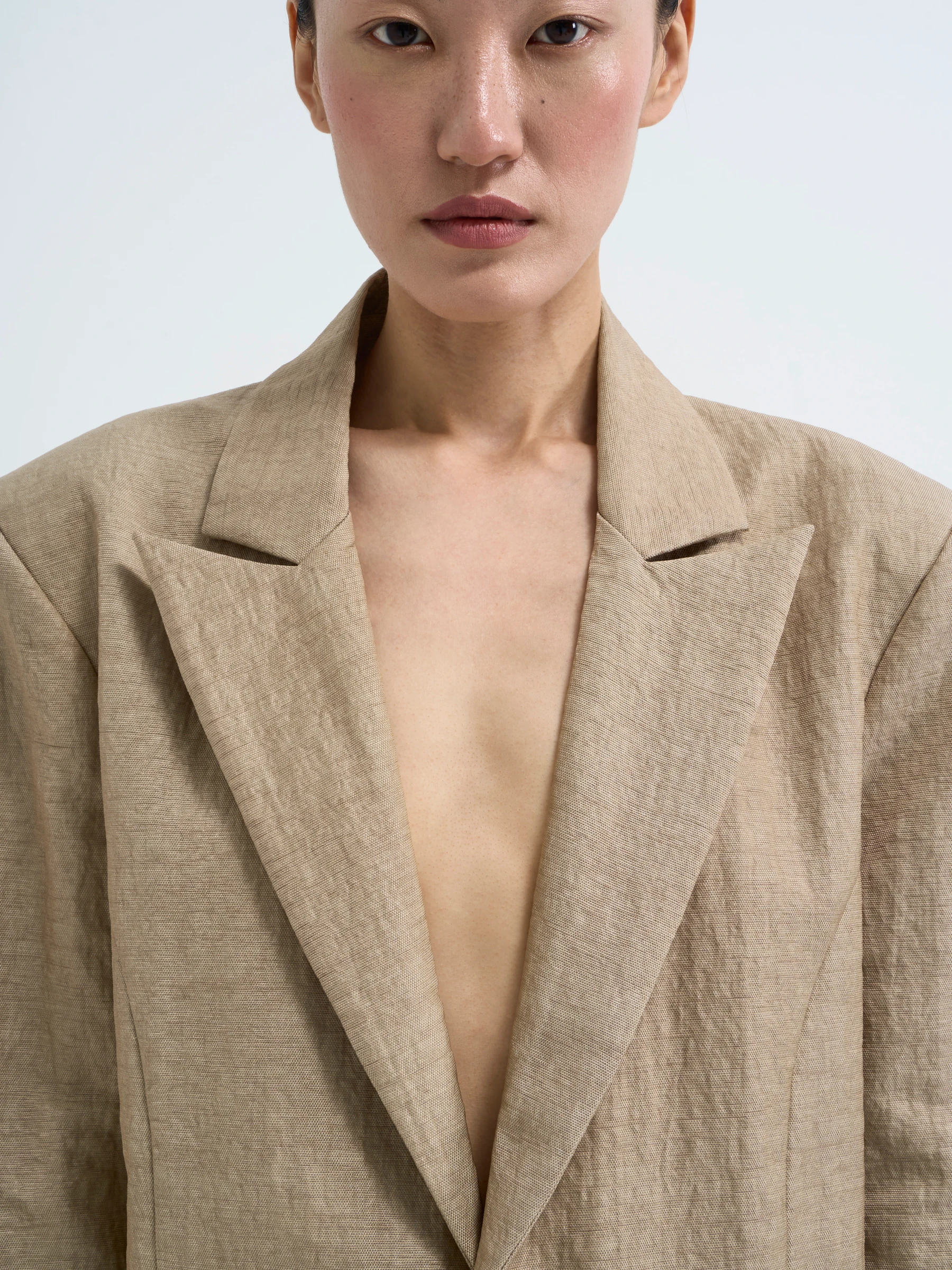 Beige backless blazer in Foxing, front view