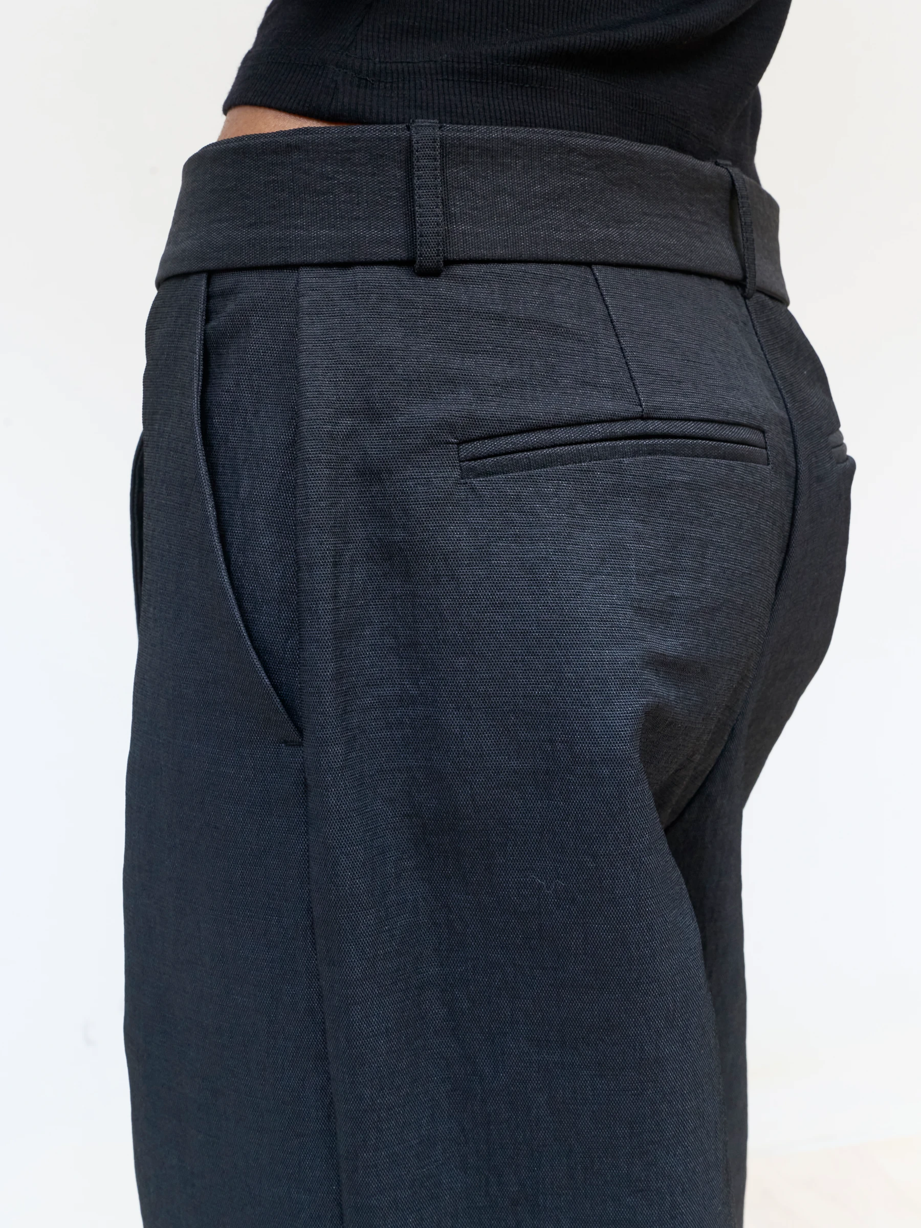 Black wide leg trousers in 9B, back view