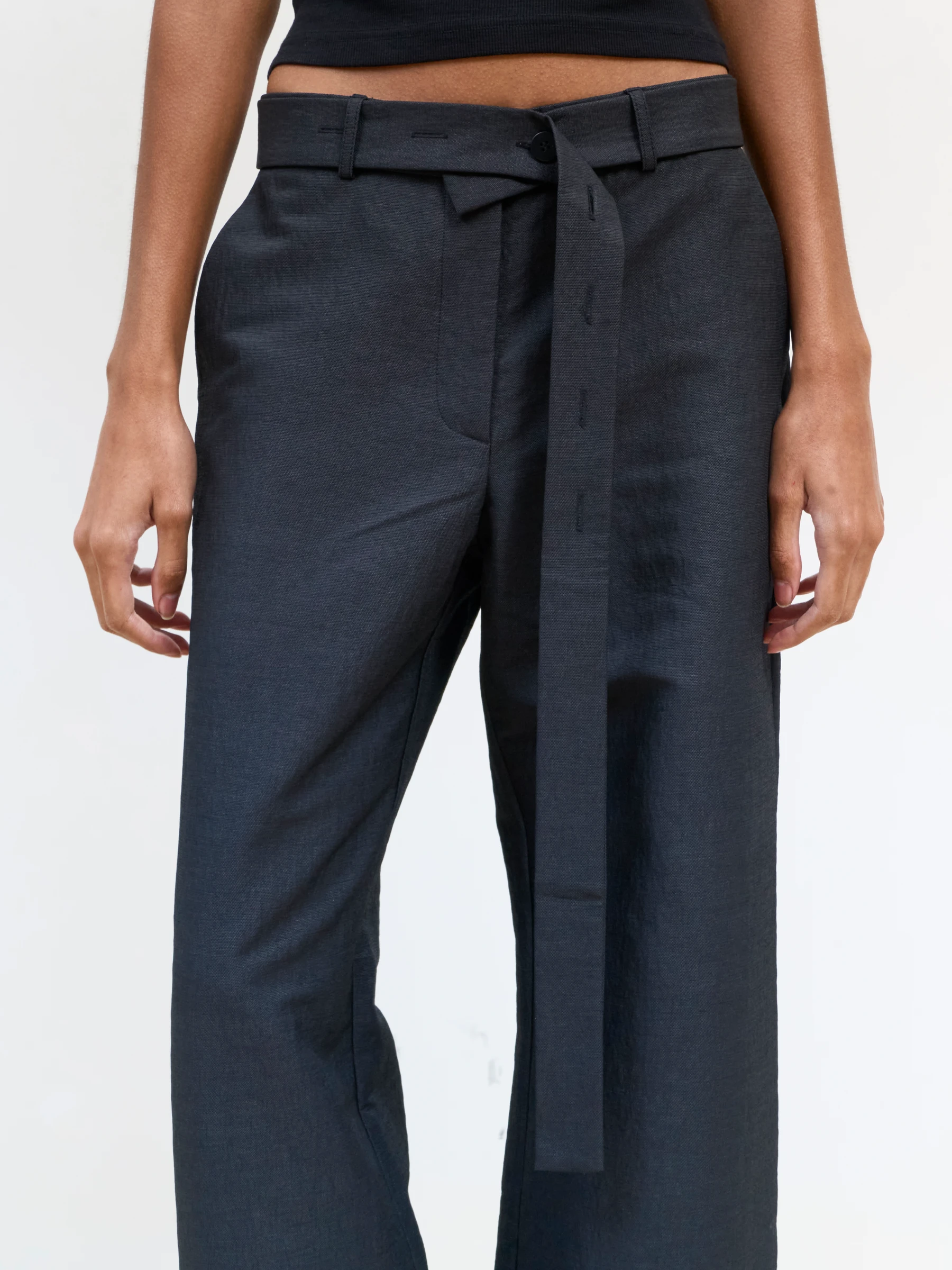 Black wide leg trousers in 9B, front view