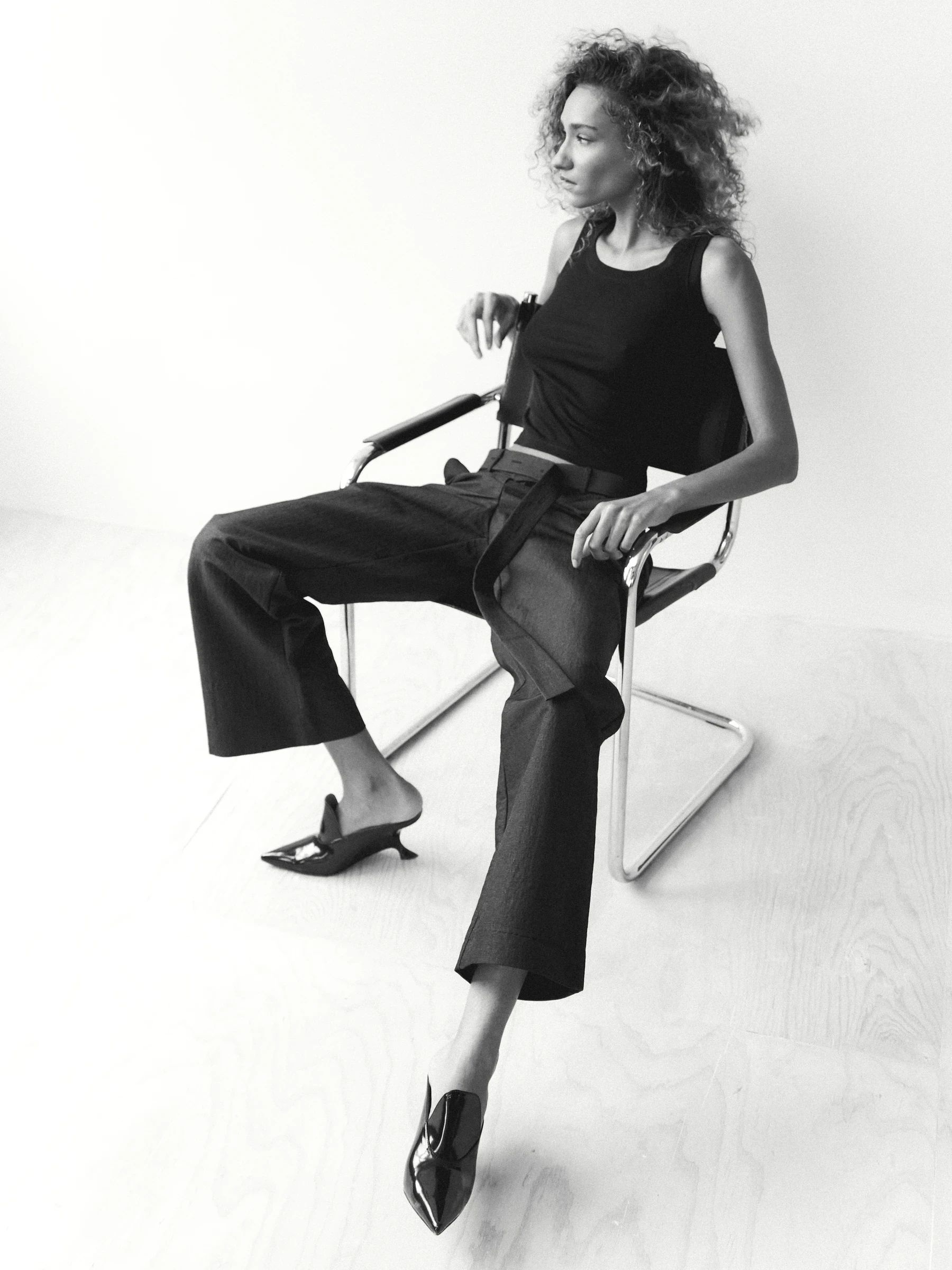 Black wide leg trousers in 9B, side view