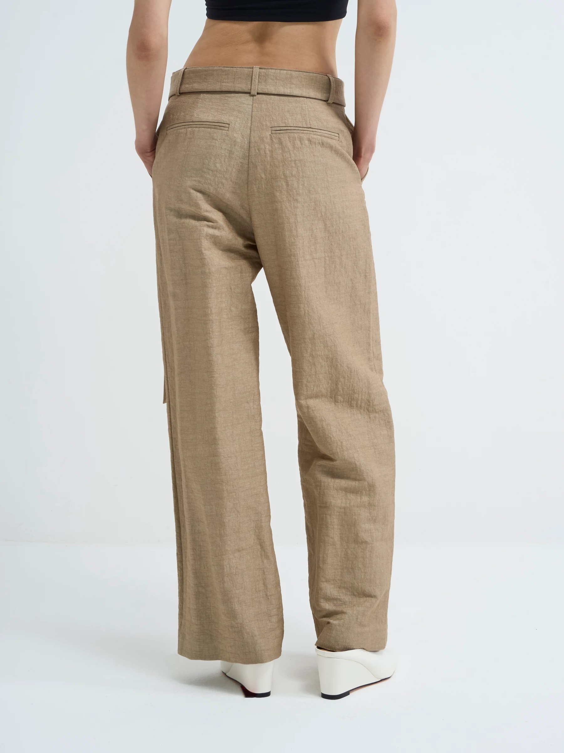 Beige wide leg trousers in Foxing, back view